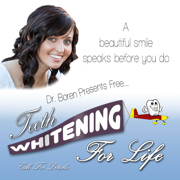 Beautiful woman smiling for free teeth whitening for life promotion at Dr. Dane Boren's office. Call for details